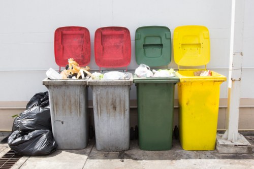 Professional waste clearance team managing construction debris